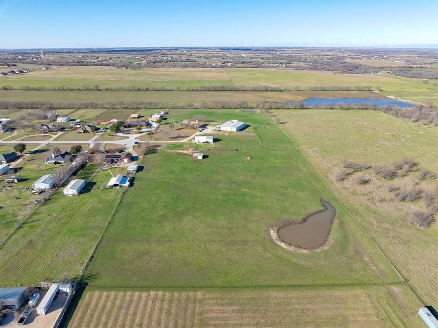 6.265 acres nestled in a well established neighborhood just minutes from I-35! Lot is fully fenced so keeping animals in wont be an issue or expense! Seasonal pond and loafing shed are currently on the property, ready for you to use! So bring your house plans as this land is waiting to shine!  Be sure CRESTVIEW is ONE word in your GPS or you will end up in Downtown Sanger.