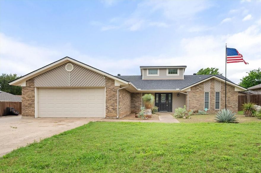 Summer-ready & move-in perfect! This updated 3BD,2BA Benbrook gem offers 1,743 sqft of stylish living with wood floors, fresh paint, and cleaned carpets throughout. The white-on-white kitchen shines with stainless appliances, double oven, and a charming window seat with storage. Both baths updated. Step outside to your private liner pool, ideal for the Texas heat, plus a covered patio for shaded entertaining and a separate dog run. Low maintenance front landscaping. Walking distance to the middle and high school. Keep your energy rates low, with solar panels.  HUGE BONUS: Assumable VA loan at under 4% interest, a rare opportunity to secure a below market rate! Solar panels are an assumable loan.