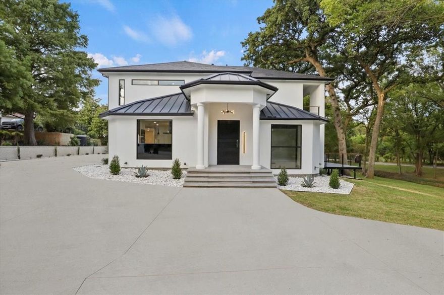 Welcome to 700 garden court, have you been looking for a completely renovated home, with modern finishes? This is the one for you!
This beauty is located in a highly sought-after neighborhood. The home features 4 bedrooms, each with ensuite bathrooms, 2 living areas perfect for entertaining and upcoming holidays. Interior features, hardwood floors, marble kitchen island, viking stainless steel appliances along with smart home technology.  The exterior updates include new stucco, brand new standing seam roof, modern light fixtures and Saint Augustine sod along with turf surrounding the pool. The backyard is truly an outdoor oasis which includes a fully equipped outdoor kitchen, gas firepit, outdoor shower and private seating area surrounded by mature trees creating the perfect outdoor scenery.