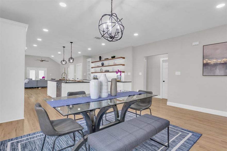 MOTIVATED SELLER. Located just two miles from Bishop Arts District, this home offers the perfect balance of historic and modern living. Perfect prime location and located near major highways like i35 and i30. The kitchen will leave you amazed with large kitchen space along with granite countertops. Featuring an open bright layout this home is designed for both comfort and style. Inside you'll find update modern light fixtures, tankless water heater paired with HVAC system for added convenience. Fully reimagined down to the studs, this charing 3 bedroom, 2 full baths new construction beauty combines both classic character with modern beauty.