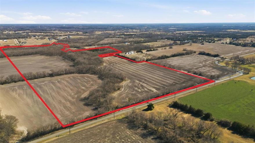 Rare opportunity to acquire approximately 55.89 acres in the fast-growing Anna market. Strong long-term development potential. The property offers mostly open, gently sloping terrain and is well-suited for a variety of uses including future development, agricultural operations, recreational use, or strategic land hold.

The tract is located within a FEMA floodplain, zoned AE; however, development is permitted with floodplain mitigation and buildable area planning. This presents a compelling opportunity for buyers experienced in land development, engineering solutions, or phased development strategies.
No known pipelines or major easements beyond standard road frontage. 


Buyer to verify all zoning, ETJ status, floodplain classification, utilities, and intended use.