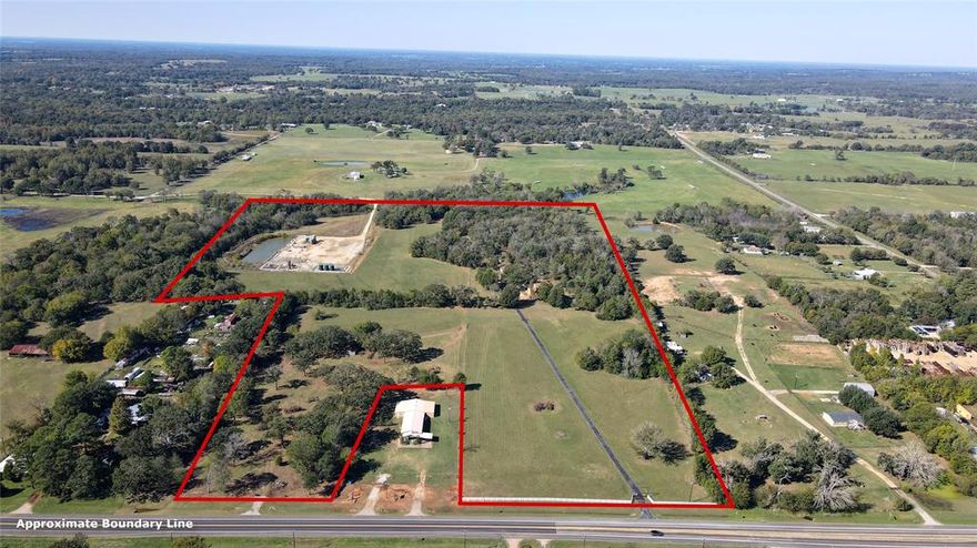 THE HOME PLACE-Spacious two-story, four-bedroom, three-bath home on appx 42.786 acres located north of Athens. A stately gate and asphalt road leads gently through meadows dotted with native oaks. Other improvements include a 2,500 sf shop with air and heat, stables, and more.