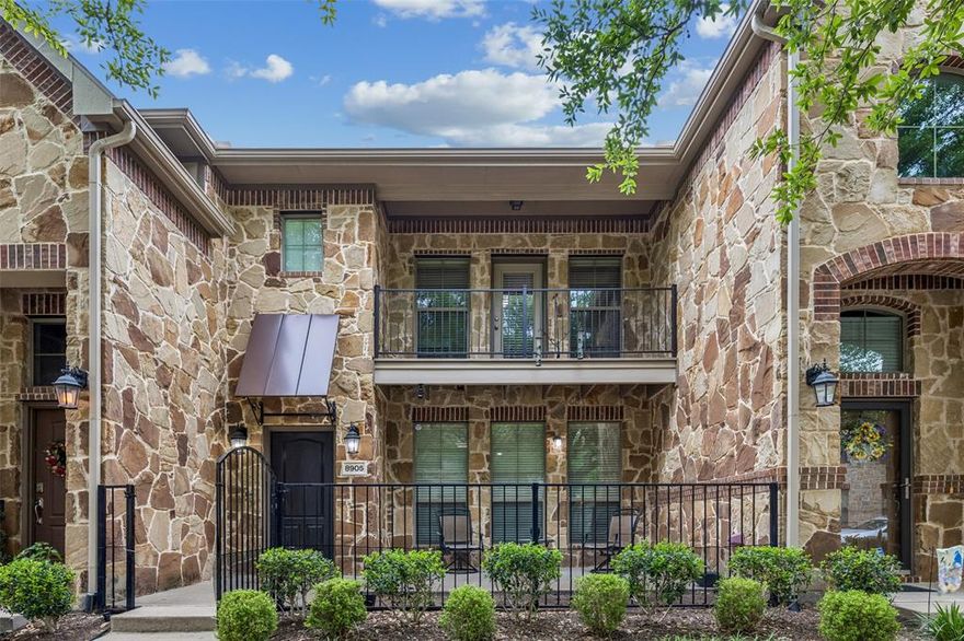 Beautiful townhome filled with thoughtful upgrades and stylish finishes throughout! This inviting home features rich wood flooring, reverse osmosis drinking water, and convenient rack shelving in the garage for added storage. Exceptional curb appeal shines with a charming stone façade, an upstairs balcony, and a private front patio with wrought iron fencing—perfect for enjoying the outdoors. One of the the most beautiful units and is perfectly located within a few steps of the Park which leads to the pool area. Inside, the open-concept floorplan is bathed in natural light, creating a bright and welcoming atmosphere. The spacious living and dining areas flow seamlessly into a stunning kitchen equipped with a gas cooktop, abundant cabinetry, and generous counter space—ideal for both everyday living and entertaining. The oversized walk-in closet provides ample storage, while the well-appointed laundry room includes a drip-dry area, space for a full-size side-by-side washer and dryer, and built-in cabinets for added convenience.  An attached two-car garage offers security, storage, and ease of access. Residents enjoy a vibrant community with resort-style amenities including a pool, clubhouse, and scenic jogging paths. Ideally located with quick access to major roadways, top-rated schools, and a variety of nearby shopping and dining options, this home truly has it all! Seller offering a $2,500 concession! Schedule a private showing today and don't miss this incredible, unique opportunity!