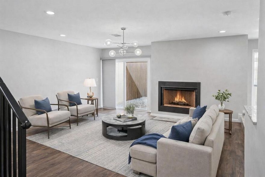 Welcome to this stunning townhome featuring 3 spacious bedrooms, 3 full bathrooms, and 1,900 sq. ft. of beautifully designed living space. Built in 2022, this home offers modern luxury and low-maintenance living in the heart of Dallas—a rare find! Step inside to discover an open-concept layout with luxury vinyl plank flooring, designer lighting, and a striking fireplace centerpiece in the living room. The chef’s kitchen is a showstopper with granite countertops, custom cabinetry, stainless steel appliances, and an eye-catching tile backsplash. Spacious dining room is conveniently located. This home is perfect for entertaining or everyday living.
Enjoy the generous natural light throughout the home. The primary suite offers a cozy fireplace, two large walk-in closets, and access to a private walk-out balcony. The two secondary bedrooms each feature their own ensuite bathrooms, creating private suite-like retreats for family or guests. The property also includes a two-car garage with an additional bonus area—perfect for storage, a small workshop, or hobby space. Residents enjoy access to a community pool, tennis and basketball courts, and a clubhouse, promoting an active and social lifestyle. Conveniently located near shopping, dining, and major highways, this move-in ready home blends style and function in a prime Dallas location. Don’t miss the opportunity to own a like-new home with exceptional features and thoughtful design! This home features amenities including a clubhouse, 2 pools, basketball and tennis courts.