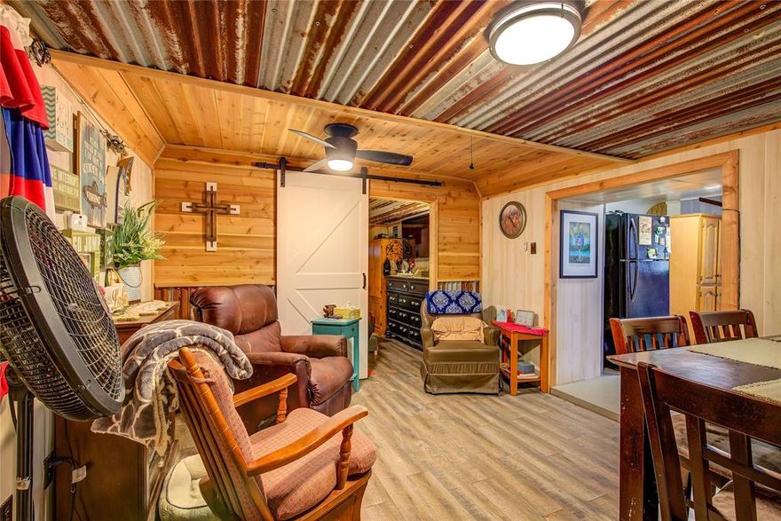 Welcome to your AFFORDABLE lakeside haven! Nestled on World Famous Lake Fork in Sun Eagle bay resort, this unique property is your next weekend getaway or full time living option! Offering an unbeatable combination of natural beauty, comfort, and adventure. Whether you're looking to go fishing, swimming or entertain guests, this one delivers without a hefty monthly mortgage!

There is plenty of room for the whole family with a renovated 1982 RV with a holding tank, 12x24 additional structure for living and dining, and a 10x12 Bunkhouse for your overnight guests. Generous amount of additional parking for cars, boats, and RVs. Make memories sitting around a fire, sipping coffee in the mornings on the covered patio and take in all the things that Lake Fork has to offer!

Perks of living in Sun Eagle bay include private boat ramp, fishing pier, pavilion and the largest community swimming pool in Wood County! Make this one your happy place and permanent retreat!