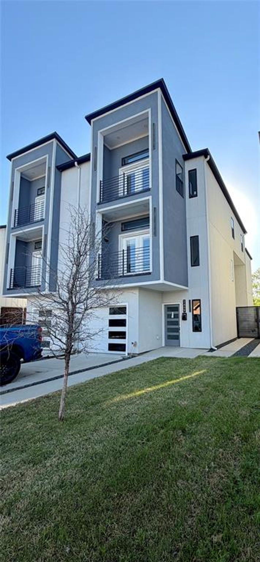 Stunning 3-story half duplex featuring 4 bedrooms and 4.5 bathrooms. This modern home offers an open concept layout, sleek finishes, and abundant natural light throughout. Enjoy a spacious kitchen with a large island, contemporary design elements, and stylish full bathrooms in every room. Perfect home for comfortable living and entertaining.