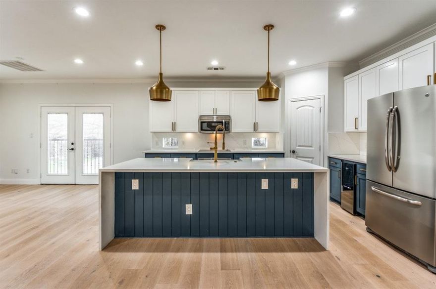 Motivated seller.  Beautifully renovated 3-story townhouse in a gated community near Lower Greenville, Knox-Henderson, Uptown, SMU, and Highland Park. No rental restrictions and perfect for an investment property, second home, or primary residence.  Over $150K in recent upgrades, replacing the AC units, new wood floors throughout, quartz countertops with backsplash, stainless steel appliances, and remodeled bathrooms. Floor plan includes 2 bedrooms with private ensuite baths, an office, and 2.5 total baths. Primary suite features a Japanese soaking tub, rainfall shower with handheld, and premium bidet with remote, auto flush, and seat warmers.  Private backyard plus deeded front yard space. Small gated community offers security and privacy with easy access to Dallas dining, shopping, and nightlife. No rental restrictions.