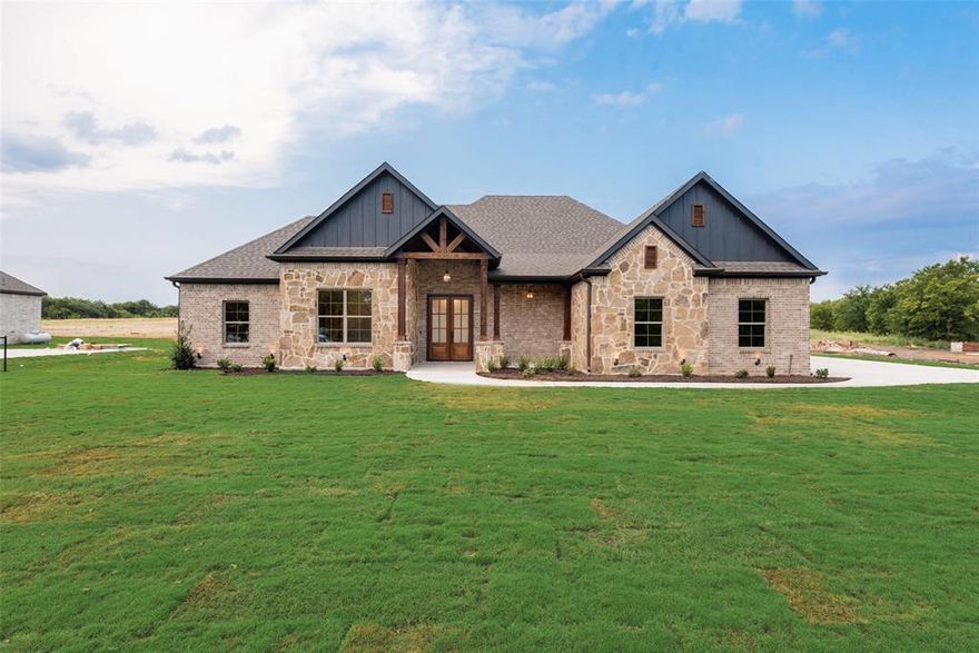 TGC Custom Homes – Oak Plan
Crafted by a premier North Texas builder, this 4-bedroom, 2.5-bath Oak Plan offers modern comfort with timeless craftsmanship. Nestled on a 2.97-acre treed lot, the setting provides both shade and serenity, while the well water adds long-term value and sustainability.
Inside, an open floor plan creates effortless flow for daily living and entertaining, anchored by a cozy fireplace. Step outside to enjoy peaceful views from the covered front and back porches, perfect for relaxing mornings or quiet evenings. The back porch even has a fireplace so that you can be cozy on cool fall evenings. With quality design, natural beauty, and the space you’ve been searching for, this Oak Plan truly feels like home.
Home completion will be by November 2025.  All information is deemed reliable but not guaranteed. Buyer and Buyer's agent must complete their own due diligence.  Pictures in the listing are of a previously built home. Finish outs may vary.