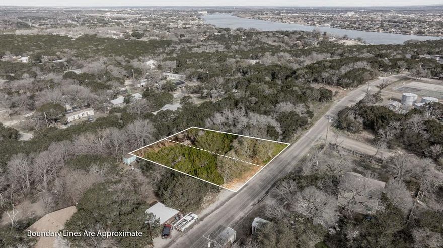 The seller of these TWO desirable lots is offering them as ONE.  908 and 910 Scenic Drive combine for over 3 tenths of an acre!  Take advantage of this great opportunity to be near everything Lake Granbury has to offer in Comanche Harbor outside of city limits. This property is conveniently located less than a mile from the Brazos River & Granbury Lake and a short drive to downtown Granbury. Comanche harbor provides two community boat ramps, community center, parks and docks. Come take a look today!