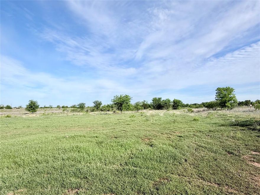 This 3.533-acre lot inside the city limits of Whitney is mostly open with a few trees along the back, offering an easy build with added privacy. Located in the gated Lakewood Acres subdivision with City water service, underground electric, and a chip sealed road. Deed restrictions align with City of Whitney rules. Enjoy wildlife and space close to town.