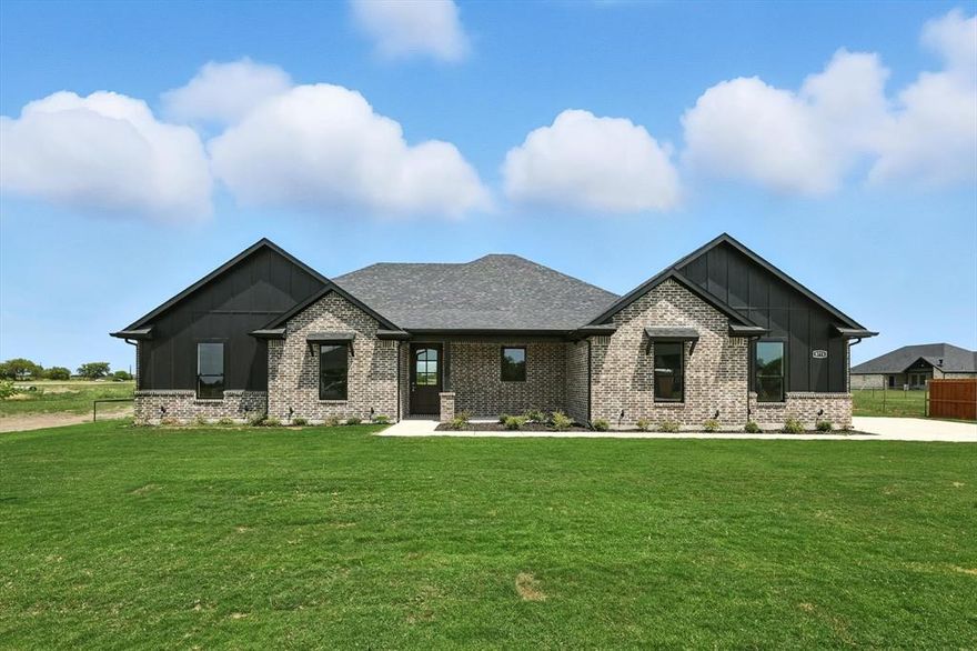 CONTACT AGENT FOR NOVEMBER INCENTIVES!!! listed in the highly sought-after Indian Trail Estates, KRUM ISD! This brand-new construction is complete and move-in ready, featuring an open layout, quartz countertops, stainless steel appliances, and custom finish-out. Designed for flexibility, the home offers a primary bedroom plus a second primary mother-in-law suite—perfect for multi-generational living or long-term guests. Situated on a 1-acre lot with a spacious backyard, outdoor kitchen, and full spray foam insulation for maximum energy efficiency, this property offers unmatched freedom with NO HOA, NO city tax, and NO MUD or PID. The builder includes a one-year bumper-to-bumper warranty plus an additional 2-10 warranty at no cost, with preferred lender incentives available through Jimmy Lemly at Texas Regional Bank. This functional and highly desired floor plan combines a peaceful rural setting with convenient access—just 20 minutes to Denton’s vibrant Rayzor Ranch for shopping, dining, and entertainment. Available now!