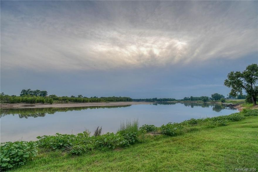 MAKE AN OFFER!!! Experience the luxury of owning an expansive, prime waterfront lot that boasts enchanting views of the brilliant hues of the sunset, nestled within the esteemed River Bluff Subdivision. This exquisite property finds its home on the verdant banks of the iconic Red River, offering you an unmatched opportunity to build your dream residence surrounded by pure tranquility and natural beauty.
The lot itself is pleasingly level, providing the perfect blank canvas to create a home that reflects your unique style and taste. Embrace the potential for exquisite landscaping and outdoor design, or simply savor the natural charm of your surroundings - the possibilities are truly limitless.
The seller, directly motivated by the desire to pass on the reins to someone who can appreciate its true potential, has invested an impressive amount into developing this property. We encourage you to submit any and all offers on this fabulous waterfront property.