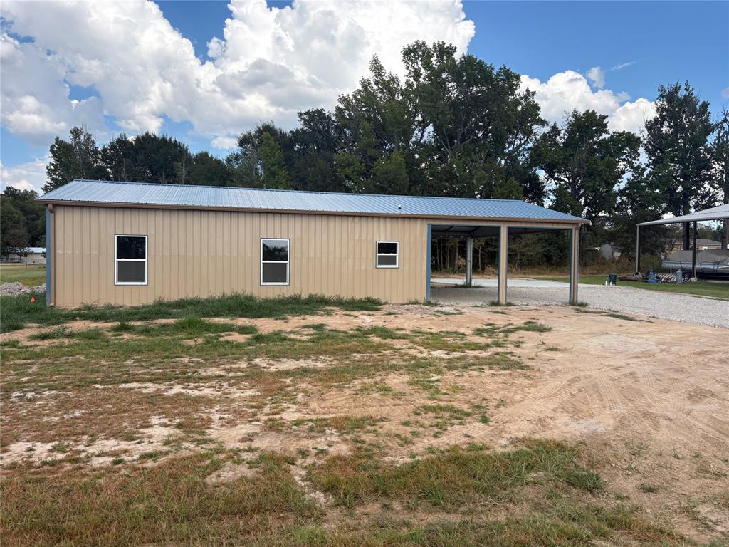 Photo of 644 Comanche, Quitman, TX 75783 (MLS # 21375001)