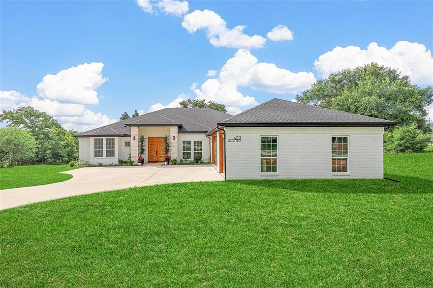 Better-than-new modern one-story tucked at the end of a quiet cul-de-sac. This 4 bedroom, 3 bath home with an oversized 3 car garage welcomes you with soaring ceilings, an open floor plan, and a custom cedar fireplace surround anchoring the living room.

The chef's kitchen stuns with a massive island, quartz countertops, and top-of-the-line stainless steel appliances. The owner's suite offers privacy, peaceful backyard views, dual his-and-hers walk-in closets, and a spa-like ensuite with a standalone tub and oversized shower. Three additional bedrooms are generously sized with walk-in closets, and a dedicated office sits behind stylish barn doors off the living room, perfect for remote work or hobbies.

Step out to the covered patio and a secluded two thirds acre lot with room for a pool and no neighbors behind. A full sprinkler system keeps the grounds lush year-round. Minutes from Downtown Granbury, Lake Granbury, HEB, Kroger, and Walmart, with Fort Worth just 35 minutes away.

Open house this Saturday and Sunday 11AM-3PM, During Open house hours, you can use the following gate code to enter the gated community: 2020. The primary community gate is located on Davis Rd.