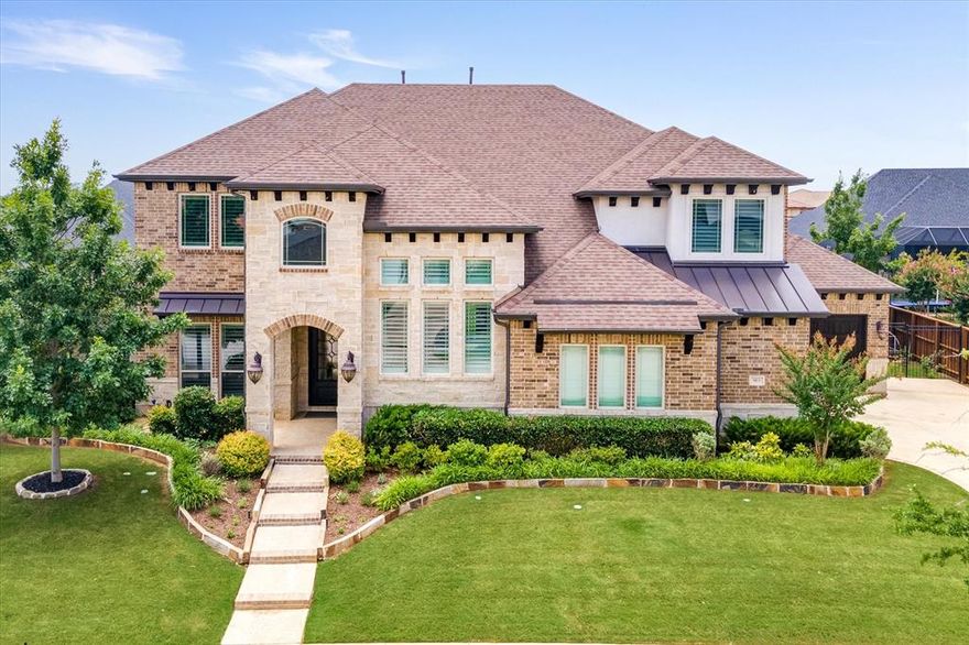 Gorgeous custom estate home in Carillon with open, functional floor plan. Large living area boasts a stone fireplace, wall of windows and a beamed ceiling.  Open to dining and kitchen with plenty of counter space, Thermador appliances and decorative backsplash. Bonus room and powder bath off kitchen with built in bar and access to patio. Private study with lots of light and built in bookshelves. Owner suite is oversized, calm grey and white owner bath opens to floor to ceiling hanging and lots of shelves, as well as an entrance to the safe room. Guest suite is on the first level with walk in shower.  Second floor includes game room with window seat and bar area, barn doors, media room, and three bedrooms all with ensuite baths and walk in closets. The crown jewel of this home is the expansive backyard where imagination can run wild. Large enough for a pool, hot tub, splash pad, playground and much more. Wide covered patio with built in gas grill and frig, perfect for family gatherings.