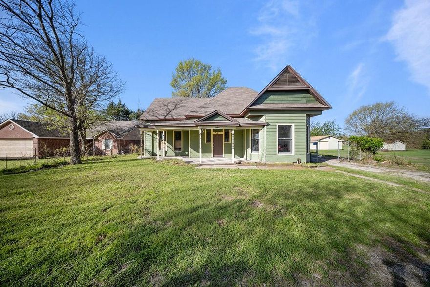 Experience a historic treasure in Garrett, Texas, built in the 1880s and brimming with charm. This nearly 2,000-square-foot home offers 3 bedrooms, 2 baths, and original details at every turn—grand interior barn doors, antique hardware, and sun-filled living spaces. Nestled just minutes from Ennis, close to shopping, restaurants, along with year round events, and the famous Ennis Bluebonnet Trail. Meanwhile, Dallas is a quick drive away. This home invites you to step into a bygone era while staying connected to all the timeless comforts of Ennis and beyond.  Enjoy small-town charm with big-city access. While some finishing touches remain, the potential is limitless—this is your chance to craft a dream home rich in history and future possibilities.