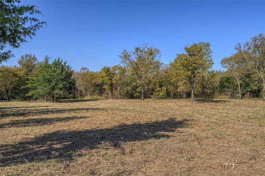 Discover an exceptional 4.47 acre property in a highly desirable area of west Sherman. Located just minutes from Highway 82 and FM 1417, this tract offers a combination of privacy, convenience, and long-term potential. The land features a natural, brush-covered landscape with gentle terrain, ideal for creating a secluded homesite. Electricity and city water are available. Whether you're looking to build, invest, or create a private retreat, this 4.47 acre site presents an excellent opportunity to secure acreage in one of Sherman’s fastest growing corridors.