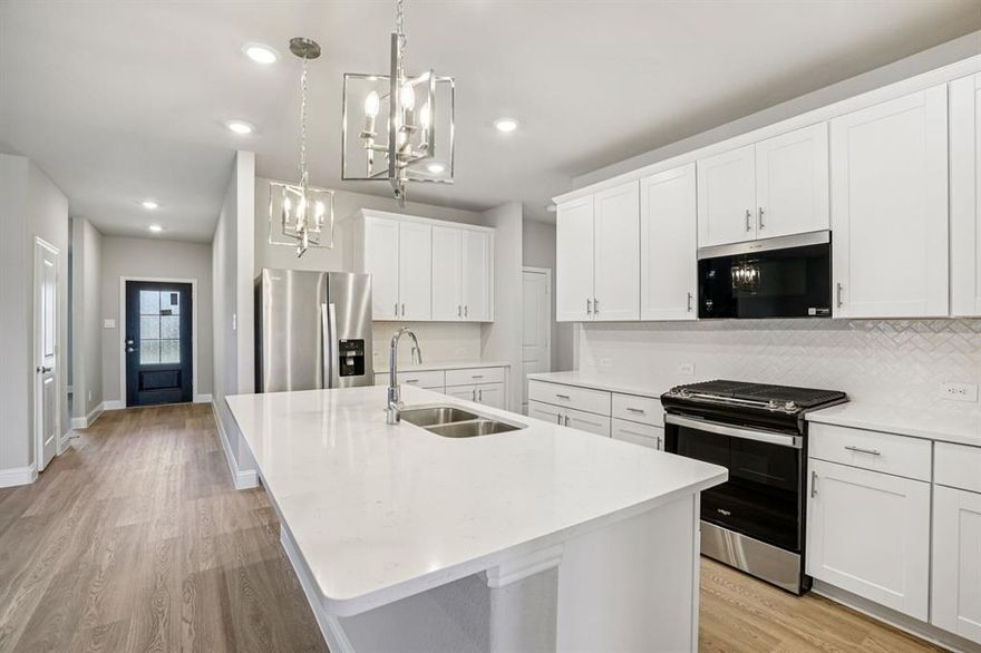 BRAND NEW energy - efficient home May 2026! The Beckley's front flex space and living room with volume ceiling make a striking impression. White cabinets with veined white quartz countertops, tan tone EVP flooring with dark beige tweed carpet. Lakehaven is a master-planned community located at the edge of Lavon Lake, featuring all of the modern amenities. Family time will turn into lake time during the warm Texas summers. The Spring Series will boast six floorplans from our National Park Collection that range in size from approximately 1,270 sq. ft. to 2,255 sq. ft. Each of our homes is built with innovative, energy-efficient features designed to help you enjoy more savings, better health, real comfort and peace of mind.