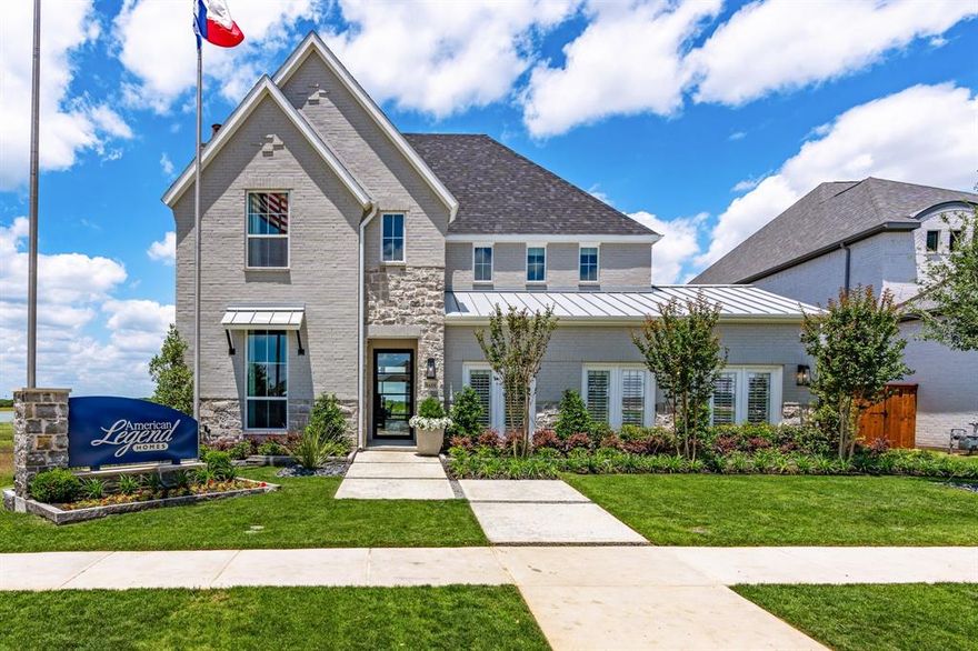 Discover luxury resort living at 8608 Scotty's Lake Lane. The light pours into this home with expansive windows on the first and second floor and wall-to-wall sliding doors in the family room and main bedroom. This model home was specifically designed for our lake lots here in The Tribute and boasts 4,718 square feet of expertly crafted space including 5 bedrooms, 5 full bathrooms, a powder bath, a study, wine room, game, media and card rooms! Enjoy an upgraded landscape package and a breathtaking view of Lake Lewisville from a variety of outdoor living spaces...the extended covered patio with pavers, the private patio off of the main bedroom or the 2nd floor covered balcony off of the game room. The views from inside and outside are simply majestic. The main suite features a free standing tub and a beautiful walk-in shower plus two walk-in closets. Upstairs offers three additional bedrooms, a tech center with built-in cabinets and a desk area, plus a game room and adjacent card room with balcony access to enjoy the views. The state-of-the-art media room features a convenient dry bar at the entry. A 3-car garage completes this exquisite property, making it a must-see for discerning buyers. This gorgeous model home will be sold WITH all furnishings and accessories!