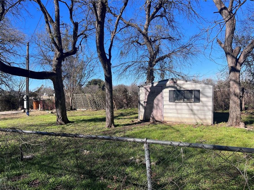 3 lots side by side with all utilities including septic that was pumped last year. Chain link fence on 4 sides, no gate. Large trees. Located in gated subdivision of Indian Harbor in Granbury. Amenities include Boat ramp, marina, community pool, clubhouse, walking trail. No neighbors behind this property. This is a great opportunity for anyone.