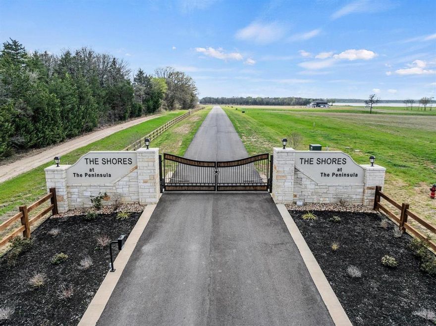 Seize a rare and exceptional opportunity to own a sprawling 1.6-acre lakefront lot on the pristine shores of Bois D'Arc Lake, one of Texas' newest and most sought-after destinations.  This prime property boasts over 250 feet of lake frontage and is DOCK CAPABLE, offering spectacular views and direct access to deep, crystal-clear waters—perfect for boating, fishing, and even wake surfing.  With full panoramic views of the lake, you'll enjoy stunning sunsets that paint the sky with vibrant colors each evening.  Nestled in the exclusive Peninsula community, this private, gated neighborhood promises a lifestyle of luxury and relaxation.  Future owners will have access to top-tier amenities, including a clubhouse, fitness center, community pool, and even a 9-hole putt-putt course for endless entertainment.  With underground utilities, high speed internet, and water services available at the lot, building your dream lakefront home is easier than ever.  Choose your builder and your timeline—this lot offers the flexibility to bring your vision to life, whether you’re looking for a weekend getaway or a permanent lakeside retreat.  And with short-term rental options available, including VRBO and Airbnb, this property is an excellent investment opportunity that allows you to enjoy lake life while generating income.  Bois D'Arc Lake is rapidly becoming the crown jewel of North Texas, and this 1.6-acre lot offers you the chance to be among the first to own in this exceptional community.  Don't miss out on this opportunity to secure your own piece of lakeside paradise. Your dream home awaits!