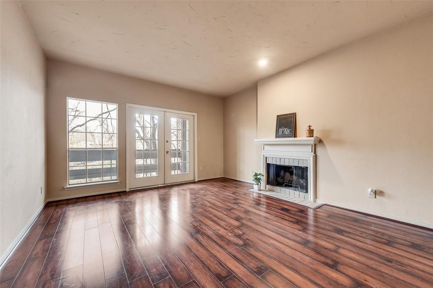 VACANT and MOVE-IN READY, this great INVESTMENT PROPERTY has been recently UPDATED and offers excellent rental Low-maintenance living. Freshly painted walls create a light and bright interior, and modern finishes make this a true turnkey opportunity. Recent updates include carpet replacement, granite countertops, backsplash, and a bar in the kitchen, plus updated fixtures and lighting. This desireable 2 bedroom, 2.5 bath is located in Woodlands within Richardson ISD. The primary suite features two spacious walk-in closets and abundant storage. The secondary bedroom offers its own private entrance making it ideal for roommates or added flexibility. Enjoy beautiful creek views and mature trees right outside your door on the patio. Reserved covered parking is just steps from the unit. The community offers an inground pool, hot tub,and club house- perfect for relaxing or entertaining.  Conveniently located near DART, shopping, dining, and major highways. Blanket insurance is covered by the HOA.