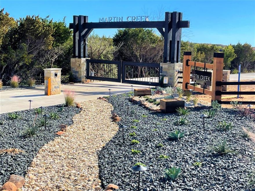 Welcome to an exceptional opportunity in Martin Creek! A rare, turnkey site for your dream estate. Nestled within a gated, 26-lot community with concrete roads and underground utilities, this offering rises above the ordinary! Approx. 5 acres of premium, unimproved land. Gently rolling terrain with gorgeous elevations, mature trees, and sweeping views! Rustic, elegant, gated entrance and a cohesive streetscape that sets a distinguished tone. Community amenities of a 10-acre common park, 3+ acre lake ideal for fishing or relaxing vistas. No build-time restrictions — you may build now or preserve this parcel for future development. Bring your own builder or coordinate with the developer for home plans and guidance. Owner financing is available! Flexible terms can help you claim this rare estate opportunity! Partial fencing. This isn’t just acreages. Its estate canvas in a thoughtfully designed, high-end neighborhood. With its private lake, scenic topography, gated entrance, and no hurry to build, this parcel allows you to create a legacy property at your pace. The amenity-rich common area and limited lots ensure both exclusivity and community appeal!