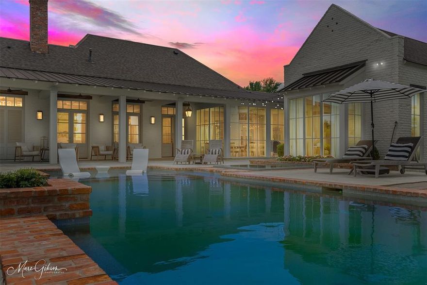 This stunning 2020 custom-built home is situated on a quiet culdesac & on 2 lots (1.392 Acres). Vintage Charm with Modern Flair! Remote Primary Ste separated from the home with a galley & framed in floor-to-ceiling windows. Primary Bath accentuated with book matched marble wall behind oversized porcelain free standing tub. Gorgeous oversized kitchen, double serving island, Wolf & Thermador appliances. White Oak Wood Flooring, Reclaimed antique brick , Reclaimed pine beams, Blue steel rock flooring. Office down, 1 BR up with Bonus Room & full bath. 3 Bdrms in their own garconniere wing. Backyard Oasis with FP, heated pool spa & pool house with half bath. Oversized Garage-3rd Gar heat & AC. Mix of shingled & standing seam metal roof components. 2 pages of unbelievable features- call me & I'll send them to YOU!