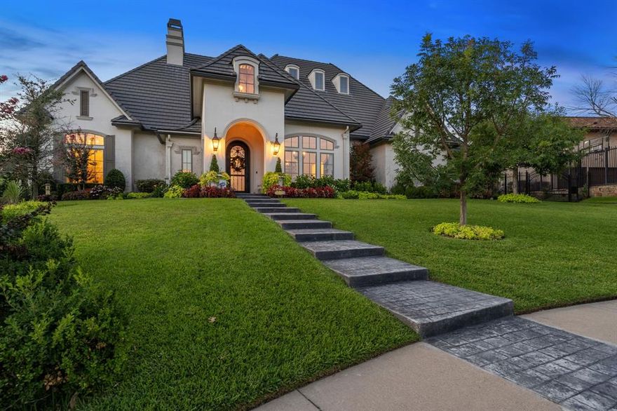 French Transitional style home on a half-acre cul-de-sac lot in the guarded gated Monsterrat neighborhood. Featuring an open floor plan, light and bright interior, hand scraped hardwood floors, beamed & cathedral ceilings, designer touches and quality craftsmanship throughout. Eat in kitchen with marble counters, center island, coffee bar, and butler’s pantry with wine fridge. First floor guest and master suite complete with a luxurious bath and walk-in closet. Formal dining, study, oversized utility room with custom island and built-ins. Additional rooms include media, game, and exercise on the 2nd level. Extraordinary outdoor dining and living areas with fireplace, built-in grill and swimming pool with spa.