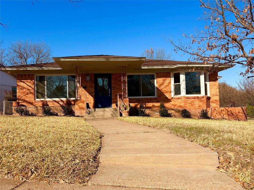 Beautifully remodeled single-family brick home on a prime corner lot directly across from Moss Park and just minutes from the vibrant Bishop Arts District. This light-filled home features an open-concept layout designed for comfortable living and entertaining. The completely remodeled kitchen flows seamlessly into the living area. All bathrooms have been fully renovated, including a stunning primary suite featuring double vanities and a private, separate toilet room for added comfort and functionality. 

Major system upgrades provide peace of mind, including all new insulation in the walls and attic, a new tankless water heater, replaced sewer lines to the street, and all new gas lines—both inside the home and extending to the meter. The whole-house rewire includes a new electrical panel, recessed lighting throughout, and Cat6 wiring for high-speed connectivity. A new security system and new smoke detectors have also been installed. 

Additional improvements include all new doors throughout the home, a finished two-car garage, and new motorized Levolor shades for effortless light control and privacy. Located steps from Moss Park and a short distance to the dining, shopping, and entertainment of Bishop Arts, this move-in ready home offers modern upgrades, exceptional location, and classic curb appeal—all in one remarkable package.