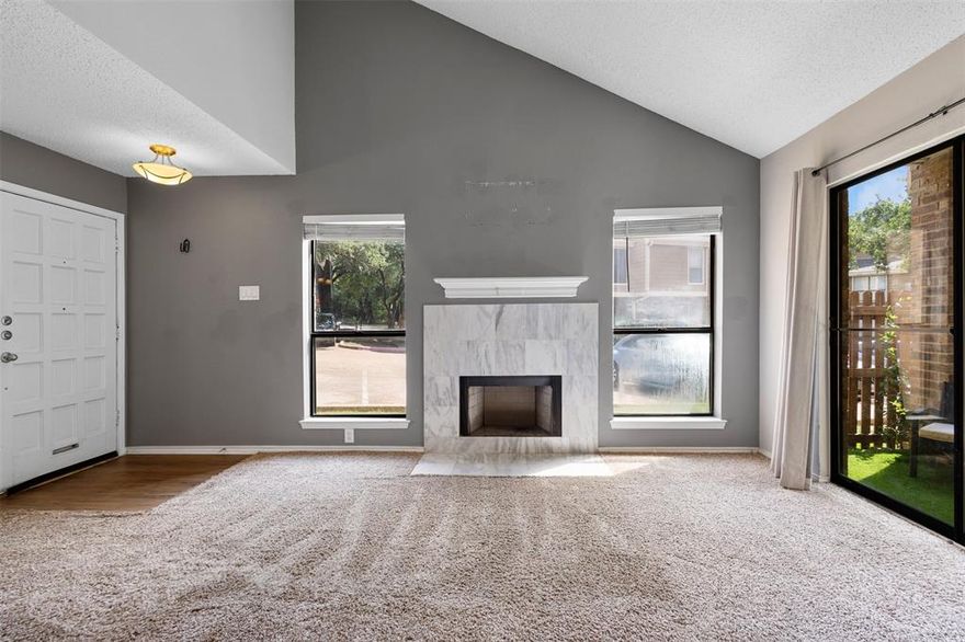 Major price drop! Own this stylish, recently updated corner condo, perfectly situated for an active lifestyle. Picture this: you're minutes from AT&T Stadium and Globe Life Park, then head straight to Lake Viridian's free beach, perfect for swimming or hitting the walking trails! This move-in ready condo offers a spacious living area with soaring ceilings, flowing seamlessly to your private patio. Enjoy the luxury of generously sized bedrooms, each with its own en-suite bathroom. With TWO dedicated parking spots and a refreshing community pool, convenience and relaxation are guaranteed. Parks are a stroll away, and I-30 access is a breeze. This isn't just a home; it's a smart investment in an unbeatable location!