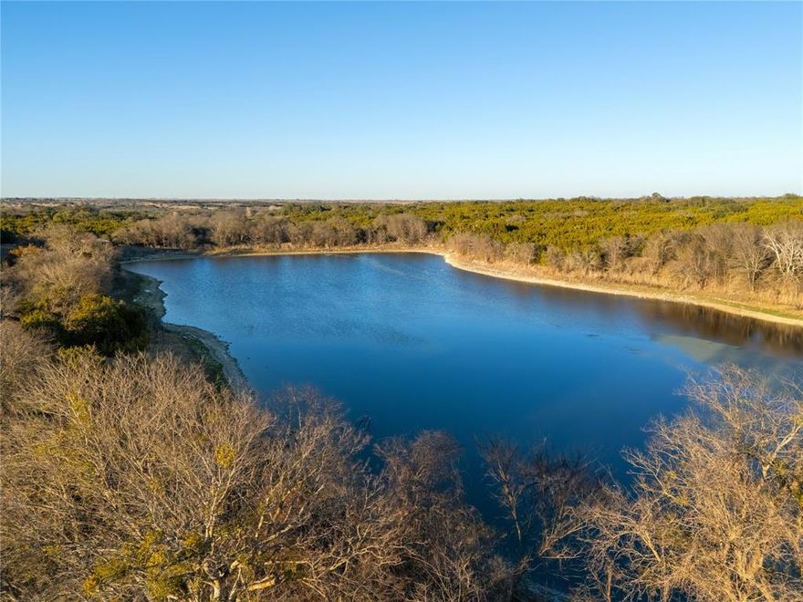 Sportsman’s Dream Property! 165+ acres in Bosque County, China Spring & Valley Mills area. This 165+ ac. recreational ranch offers abundant wildlife, excellent tree cover and multiple lakes making it an exceptional hunting and outdoor retreat. Conveniently located between China Spring and Valley Mills, the ranch provides both seclusion and accessibility. Live water is a major highlight with multiple lakes, including an approximate 6-acre lake and an additional 2+ acre aerated lake - offering excellent fishing and consistent wildlife activity. Lakes are stocked with F1 hybrid Florida bass, coppernose blue gill and perch, minnows and shad. Property features approximately 2,350 feet of CR 3550 frontage and 3,400 feet of a private  road with multiple gated entrances. Improvements include on site electricity, shooting range and roads cut throughout allowing easy access to all areas of the ranch. Rolling terrain with an approximate 60-foot elevation change offers scenic views. Heavily treed with large oaks, the ranch supports outstanding habitat for deer, hogs, bobcats and other game, plus incredible fishing and dove hunting. Food Plots in place and deer blinds and feeders will convey with the sale, making this a turnkey recreational and hunting property.  A functional storage building with a covered front porch provides convenient space for equipment and hunting gear, while offering a peaceful overlook of one of the ranch’s largest lake. Private, well improved and designed for recreation, this Bosque County ranch is ideal for a hunting & fishing, weekend getaway or long-term recreational land investment. Valley Mills schools. Heart of Texas Electric. Ag Exempt.
