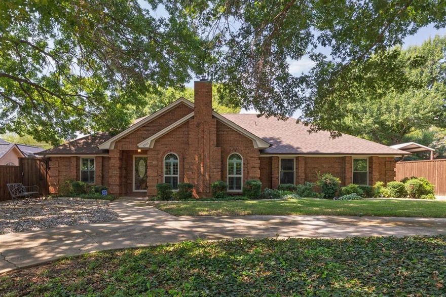 Quiet neighborhood with NO HOA in prime location for best BISD schools, 1 mile to FWY & close drive to airport & TRE. House meticulously maintained throughout. Many improvements. Roof, gutters & gutter guards 1 year old. The home is upgraded with siding so no worry about painting!  The attic has a large area floored for storage as well as added insulation and radiant barrier to reduce cooling costs. Garage has additional cabinets for storage. Landscaped large yard & flower beds with 3 huge Red Oaks trees in front & 1 large lace bark elm in back that provides shade for those hot summers! Pool can be used all summer as tree provides the shade to keep it enjoyable in August heat! Cooling is less costly due to shade.  Sprinkler systems maintain yard & flower beds with timer that can be adjusted by phone app. Beautiful pool that was updated & remodeled in 2022.  Pool comes with a cover owner can use in the winter months. Large area in back to enjoy and entertain that is shaded! Covered back patio with two ceiling fans! Fencing of back yard & sides of yard to build line with double boarded cedar and postmaster steel posts for privacy and long-lasting durability. Upgrades: Locked stone mailbox, Inside totally remodeled with granite countertops in kitchen and baths.  Both master and secondary bath remodeled with tile and new tubs and shower enclosure. Upgraded flooring of top of line dense carpet and pad in all bedrooms. The rest of the house has upgraded beautiful, engineered wood. Ceiling fans in all bedrooms, living area, dining area and master bath. All windows were replaced and upgraded. All interior windows have plantation shutters. Both bathrooms have rain glass for privacy. Main drain from house to street replaced in 2019. Six outdoor cameras and a security system. Front door has safety storm door. The fireplace has been remodeled with electric logs. All closets have Elfa from Container Store for organizing closet space. Additional parking with circular driveway.