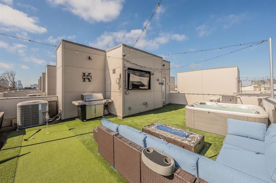 Experience refined urban living in this elegant corner-unit townhouse with NO HOA, ideally located just half a mile from the vibrant bars and restaurants of North Henderson Avenue. Spanning 2,392 square feet, this modern residence offers three spacious en-suite bedrooms and a living area filled with abundance of natural light and easy access to the rooftop retreat. The oversized turfed rooftop terrace is truly an entertainer’s dream—complete with a hot tub, gas grill, putting green, mounted TV with storm cover, and generous space for relaxing and hosting. The chef-focused kitchen features Bosch appliances, a wine fridge, a large kitchen island with a smart touch faucet, and a gas range. Additional highlights include a dual shower head in the primary bathroom, a central vacuum system, abundant storage, and a private two-car garage. Perfectly situated just off Fitzhugh, you’ll enjoy quick access to Highway 75, Ross Avenue, Lower Greenville, and you’re just steps from Monarch Park. Low-maintenance living meets prime location—this is city living at its finest.