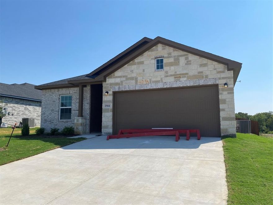 Welcome to this elegant home in Sherman, TX, ideally located near Sherman High School within the sought-after community of The Grove. This stunning home stands proudly on a spacious corner lot, basking in an abundance of natural light. Home offers three large bedrooms, two full baths, a large living room creates an inviting atmosphere for gatherings, while the formal dining area exudes sophistication. Find inspiration in the study looking into the backyard, ideal for focused work or creative pursuits. Step into the heart of the home – a modern kitchen with an open floor plan designed for both culinary excellence and seamless living. This kitchen boasts stainless steel appliances, quartz countertops, and an array of cabinets. An island centerpiece adds a touch of elegance and practicality. Indulge in the convenience of modern living! Appliances refrigerator and washer dryer are included.