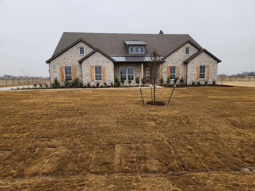 Estimated January 2026 completion! Ask us about our Trade In Trade Up program, we can buy your home! Approach the home through a covered porch, setting the stage for the elegance that lies within. Through the foyer a versatile flex room awaits, which is perfect for a cozy home office or creative space. Discover three traditional bedrooms, each accompanied by its own walk in closet and a shared full bath providing comfort and privacy for family or guests. The journey continues into the heart of the home, revealing a sprawling family room and a designer kitchen adorned with a spacious island, which is truly an entertainer's dream. For added convenience, a bonus room is tucked away in the back left. The owner's suite beckons with a spa like bathroom and an expansive closet. Adjacent to the three car garage, a mud bench and laundry room enhance practicality, a sizable covered back patio invites outdoor living. This home is zoned for Dixie Hansel Elementary, it is under construction.