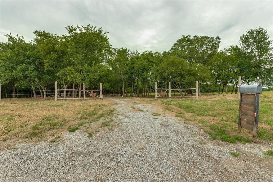 10 Acres – County Road 3805, Wolfe City, TX 75496
Escape to the serenity of Northeast Texas with this stunning 10-acre property in Fannin County, just northeast of McKinney. Comprised of two 5-acre parcels, this tract offers the perfect balance of wooded privacy and open space—ideal for your dream home, weekend retreat, or investment.

The left parcel features a canopy of mature trees, offering a private, shaded setting, while the right parcel opens up beautifully with scattered trees lining the rear—giving you flexibility in choosing your ideal build site. Whether you envision a secluded home nestled in the woods, a house set on the open land, or a blend of both, this property delivers.

A seasonal creek meanders through the northwest corner, adding natural charm and enhancing the tranquil feel of the land. There is also a pond in the back! The current owner has thoughtfully cleared portions of the property to make it more walkable and to help you better visualize how the space could be transformed.

Enjoy peaceful country living with no known restrictions, just a short drive from town conveniences. Utilities are out front. Come experience the beauty and possibilities this land has to offer.