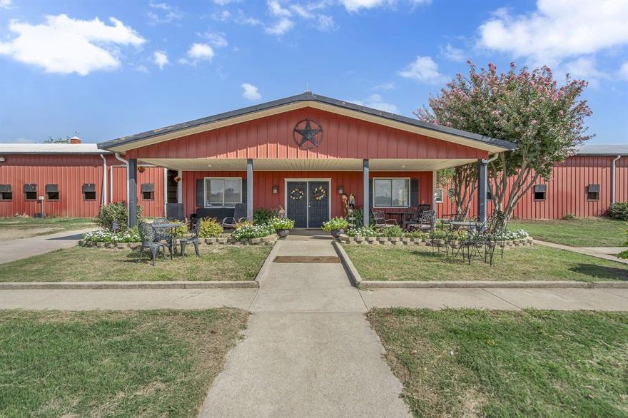 This beautiful horse farm is a rare find right in the heart of Flower Mound. As you drive onto the farm you will see large rolling pastures,16 large turnouts with pipe fencing, and a beautiful centrally located pond. Upon entering the main barn you will find a large air-conditioned lobby that has the potential to be used as an apartment for trainers or ranch hand that has a bathroom, and a kitchenette. Attached to lobby is a large indoor lighted arena 70x160 along with 42 stalls.The main barn features three tack rooms, bathrooms, numerous grooming and wash areas, and an indoor climate-controlled viewing area. Their is plenty of parking for trailers and the three arenas offer plenty of room for dressage and hunter jumper events. Immediately to the west of the main barn is an oversized outdoor arena 150x300 with 8 large piped lots for boarding horses. An additional large horse barn that contains 20 stalls that's located next to the main barn. It's a must see property with much much more!