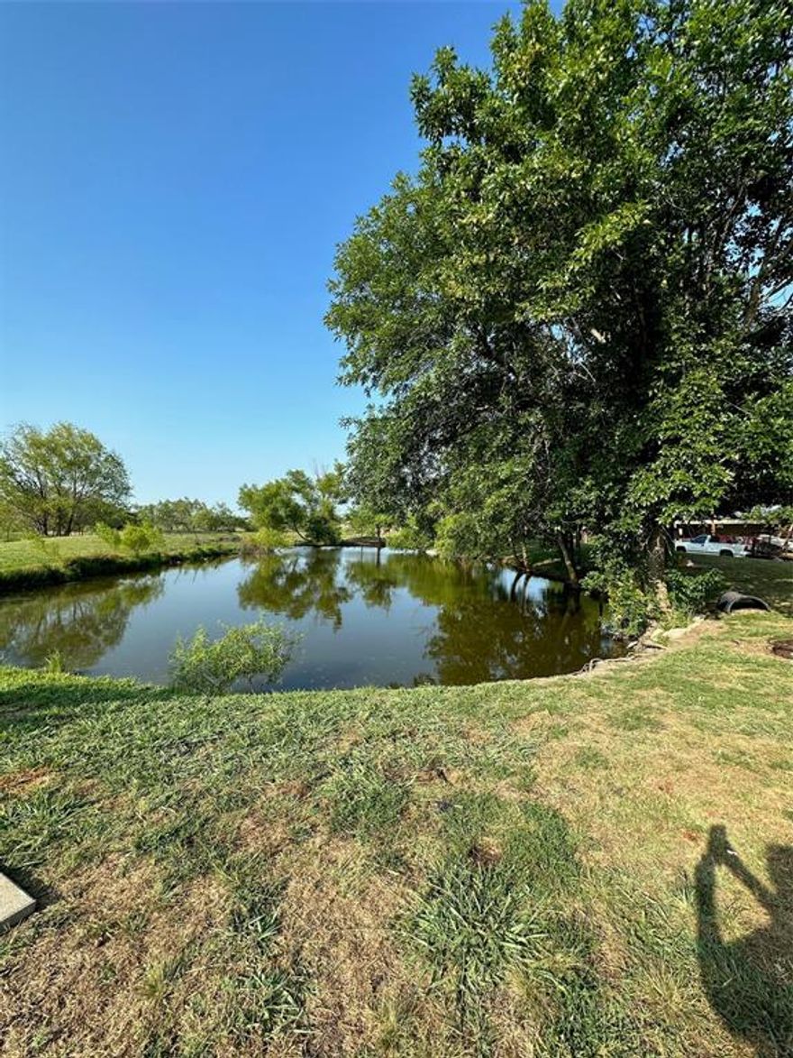 $10k Sellers concession buyers choice!  You can use this to buy down a point or towards down payment or home improvements! This is a perfect Cinderella moment. Take this beautiful property and put your finishing touches as your swept away by the tranquil pond, no HOA, almost 2 acres of land, a home with 3 bedrooms and 2 bathrooms, quick access to I-20. It is roughly 20 minutes from Dallas, and approximately a 6 minute commute to the heart of Terrell. Use your imagination. There is a large gravel drive where you can park your toys, RV, or multiple cars. The seller is determined and it is priced to sell. Marry the home, date the rate, and don't wait. This is a great opportunity. Owner is offering a $10,000 buyers choice concession that could be used for a 1 point buy down.