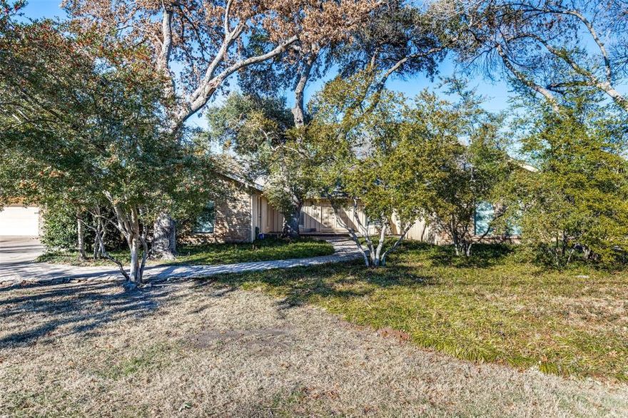 Wanting a beautiful 1.2 acre lot to build your dream home? This could be it. Beautiful treed property with a tennis court and borders a creek to one side. The large rectangular lot is ideal for building a grand home. The 4000 square foot, existing home is pier and beam and has spacious rooms including a huge kitchen with a large island. The home could be updated (sold as is) but value is in the land. See attached, detailed survey with 
 elevations and trees. Survey shows lot size 1.29 acre.