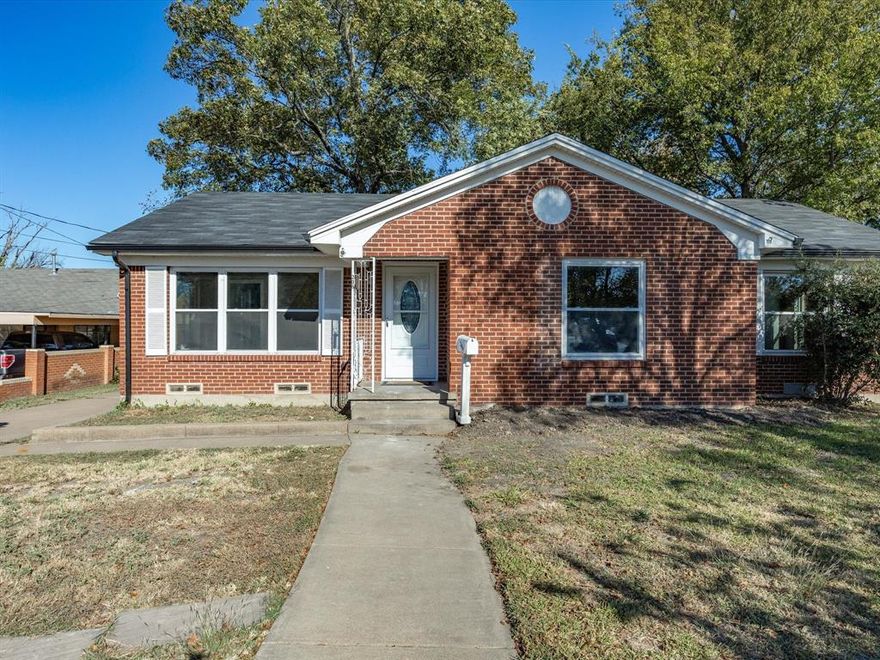 Welcome to 206 E Belknap Street in the heart of Ennis! This beautifully updated one-story brick home offers a comfortable and inviting layout featuring three bedrooms and one bathroom. Step inside to discover a bright, open living area filled with natural light, fresh paint, and ceiling fans throughout. The stunning wood-style flooring flows seamlessly from room to room, adding warmth and style to the space.
The kitchen shines with modern cabinetry, updated countertops, and plenty of storage, creating the perfect space for home-cooked meals and gatherings. Each bedroom offers a cozy retreat, while the refreshed bathroom features clean finishes and bright lighting.
Outside, you’ll find a large, fenced backyard shaded by mature trees ideal for kids, pets, or weekend barbecues. The property also includes a covered carport and storage area for added convenience.

Located just minutes from historic downtown Ennis, local schools, parks, and Highway 287, this home offers both charm and easy commuting