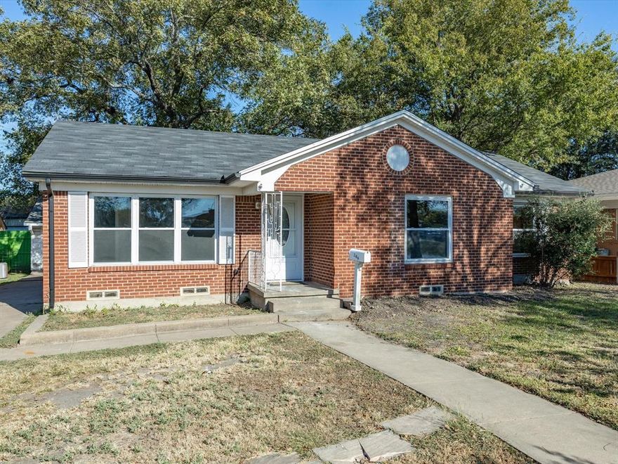 Welcome to 206 E Belknap Street in the heart of Ennis! This beautifully updated one-story brick home offers a comfortable and inviting layout featuring three bedrooms and one bathroom. Step inside to discover a bright, open living area filled with natural light, fresh paint, and ceiling fans throughout. The stunning wood-style flooring flows seamlessly from room to room, adding warmth and style to the space.
The kitchen shines with modern cabinetry, updated countertops, and plenty of storage, creating the perfect space for home-cooked meals and gatherings. Each bedroom offers a cozy retreat, while the refreshed bathroom features clean finishes and bright lighting.
Outside, you’ll find a large, fenced backyard shaded by mature trees ideal for kids, pets, or weekend barbecues. The property also includes a covered carport and storage area for added convenience.

Located just minutes from historic downtown Ennis, local schools, parks, and Highway 287, this home offers both charm and easy commuting