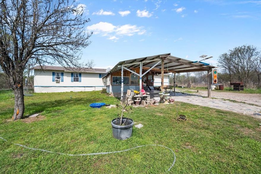 Situated on over 5 beautiful acres, this property features a mobile home plus a brand-new shop that can double as a mother-in-law suite—perfect for guests, or extra space. Enjoy peaceful mornings, wide open land, and your very own chicken coop ready for a homestead lifestyle. Endless possibilities await!