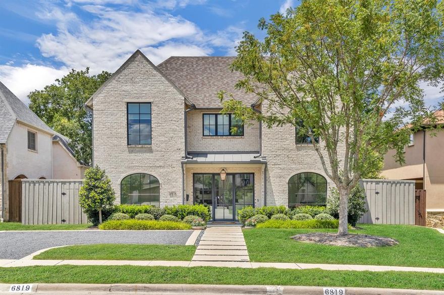 Built in 2022 by Olerio Homes, this exceptional residence in Preston Hollow combines the appeal of like-new construction with over $200K in thoughtful upgrades, creating a truly turnkey home in one of Dallas’ most coveted neighborhoods. With a transitional design and elegant finishes throughout, the home features a first-floor primary suite with a dedicated AC unit, a flexible second bedroom or office, formal dining, an open-concept kitchen and breakfast room, and a convenient computer nook tucked near the primary suite. Designer selections include Marvin windows and doors, Visual Comfort lighting, Sub-Zero and Wolf appliances, a wine fridge in the butler’s pantry, slick-finish walls, and Walker Zanger tile. Upstairs offers additional living space with a media room complete with a wet bar and beverage fridge—perfect for entertaining or relaxing. Beyond the interiors, this home offers a long list of upgrades including a pre-wired security system, tankless water heater, composition roof, slab foundation, brick construction, and an alley-access 2-car garage with automated gate. A Kohler whole-house natural gas generator was added in 2024, along with a garage storage lift system, custom window treatments and electric screen for the back porch. Outdoor living is unparalleled with a custom 10,000-gallon heated pool and spa by Selah Pools (completed July 2023), low-maintenance turf in the side and backyards, an added side exit door with dog door, and upgraded landscaping including Zoysia grass, birch trees, and a mature Chinese Pistachio tree in the front yard. Ideally located just steps from Thackery Park and minutes from top-rated schools, dining, and shopping, this Preston Hollow gem offers elevated living in a premier Dallas location.