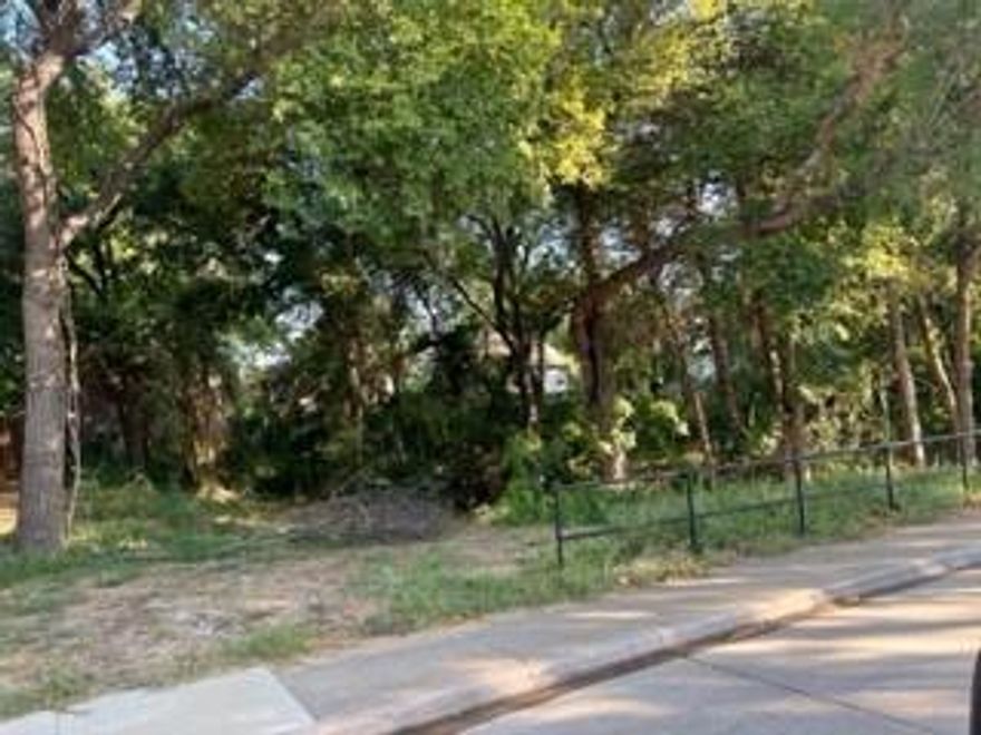 Nice Wooded Lot to build your custom home. A creek runs around sides and front of property.