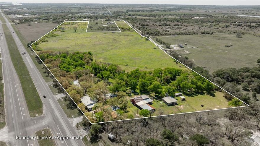 Fantastic Development Property! Check this one out! Located just outside of Stephenville on US Hwy 377! This Property has so much potential and so many uses! This one features just over 46 acres with approximatively 1195 feet of Hwy 377 frontage, along with road frontage in two places on CR379. The property features a brand new water well along with a Greens Creek water meter. There is a very nicely remodeled 3 bedroom 2 bath home, with an in ground swimming pool! There are many barns, shops and pens around the home! There is a very nice 3000 sq ft retail shop, with office and its on driveway off of Hwy 377! The property  has a total of 3 driveway entrances on Hwy 377. This one has so many uses, and potential abilities to be split up, subdivided or whatever you so choose! There is not currently another tract of land available between Stephenville and Dublin. If you are looking for your next project, this is the one you have been waiting for! So come take a look and see what you can do!! The property is also located in an opportunity zone!!