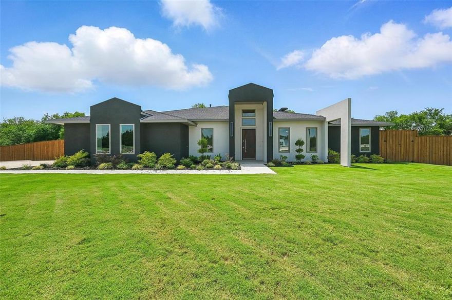 Discover a chance to purchase a beautifully crafted custom home in the acclaimed Hidden Creek Estates III - now offering interest rates as low as 4.75% when using our preferred lender. For complete details, connect with your agent or the listing agent.
Set on an expansive 0.75-acre homesite, this residence combines modern design with everyday comfort. The spacious 4-bedroom, 4-bath layout welcomes you with an open-concept floorplan that brings natural light and functionality to every room.
The main living area is warm and inviting, opening to a well-appointed kitchen featuring premium appliances, a large prep island, and a bright dining area perfect for casual meals or relaxed gatherings.
The owner’s suite provides a peaceful retreat, highlighted by a freestanding soaking tub, oversized walk-in shower, and dual walk-in closets with thoughtful storage solutions. Two secondary bedrooms include private ensuite baths, while the fourth bedroom has easy access to a full guest bath—ideal for family, visitors, or flexible use as an office or hobby space.
Out back, enjoy the privacy of a yard bordered by mature trees, offering tranquil views and plenty of room for outdoor living or future enhancements.
Finished with curated designer touches throughout, this home offers style, comfort, and exceptional livability in one of Red Oak’s premier communities while be conveniently located near I-35, I-45, and just a short drive from Downtown Dallas.
Homes of this quality and setting are limited. Schedule your private showing and experience all this property has to offer.