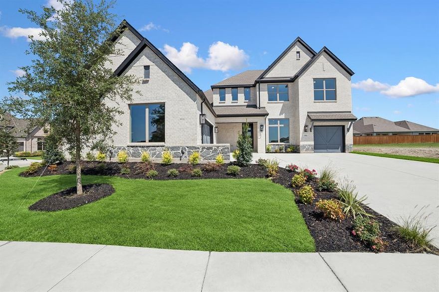 Prestige Pointe, Step into a world of sophistication and grandeur in this stunning luxury home that sits on an oversized corner homesite, where timeless design meets modern convenience. The breathtaking two-story living room, bathed in natural light from expansive windows, creates an awe inspiring space perfect for both lavish entertaining and intimate gatherings. You can’t miss the spacious and well appointed butler’s pantry, that offers ample storage and prep space. Indulge in spa like relaxation in the sumptuous soaking tub, a private retreat designed for ultimate tranquility.
Discover a residence where elegance, comfort, and prestige come together in perfect harmony. Send the David Weekley Homes at The Terraces Team a message to begin your #LivingWeekley adventure with this new home in Rockwall, Texas!