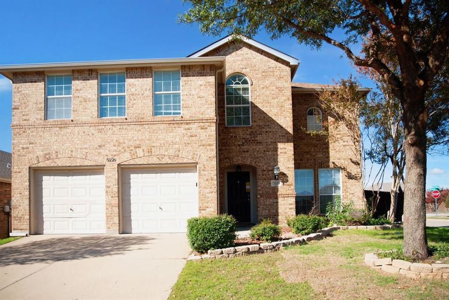 You do not want to miss this 4 bedroom, 2.5 bathroom home with a stunning brick finish! Located in the Liberty Crossing Community, this two-story home has everything you could want!

This home impresses with a spacious open-plan living area, vaulted ceilings, and an ornate brick fireplace. The kitchen also enjoys marble-like sleek countertops and a breakfast bar perfect for entertaining guests.

Just upstairs is an incredible second living area with vaulted ceilings and plenty of natural light, the perfect afternoon nap space. The upstairs primary bedroom includes a tray ceiling, a deep walk-in closet, and a full ensuite bathroom with a soaking tub. Just minutes from I-35W, you will love this home!