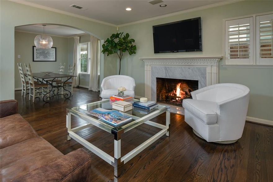 Beautifully updated with a versatile floor plan and ample natural light throughout, this expanded and mainly single story home in the heart of University Park is zoned to Hyer Elementary and is walkable to Hyer, Smith Park, tennis and play areas, area churches and Preston Center shops and restaurants. Downstairs are two spacious living areas, one with fireplace, dining room, study or office, downstairs primary suite with walk in closets, dual vanities and separate tub and shower, plus additional bedroom suite, and updated kitchen open to both living and dining areas. The kitchen enjoys white marble counters, stainless appliances and great storage. Upstairs is a third bedroom suite with loft space, vaulted ceilings and private bath. The backyard includes turfed grass area and oversized patio, perfect for play or entertaining. The two car carport offers secure parking. This wonderful location on premier Caruth Blvd. offers in-town living close to University Park amenities. A winner!